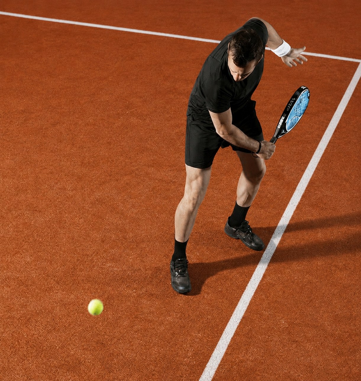 Padel match on the terracotta court at Sundown Padel Perth
